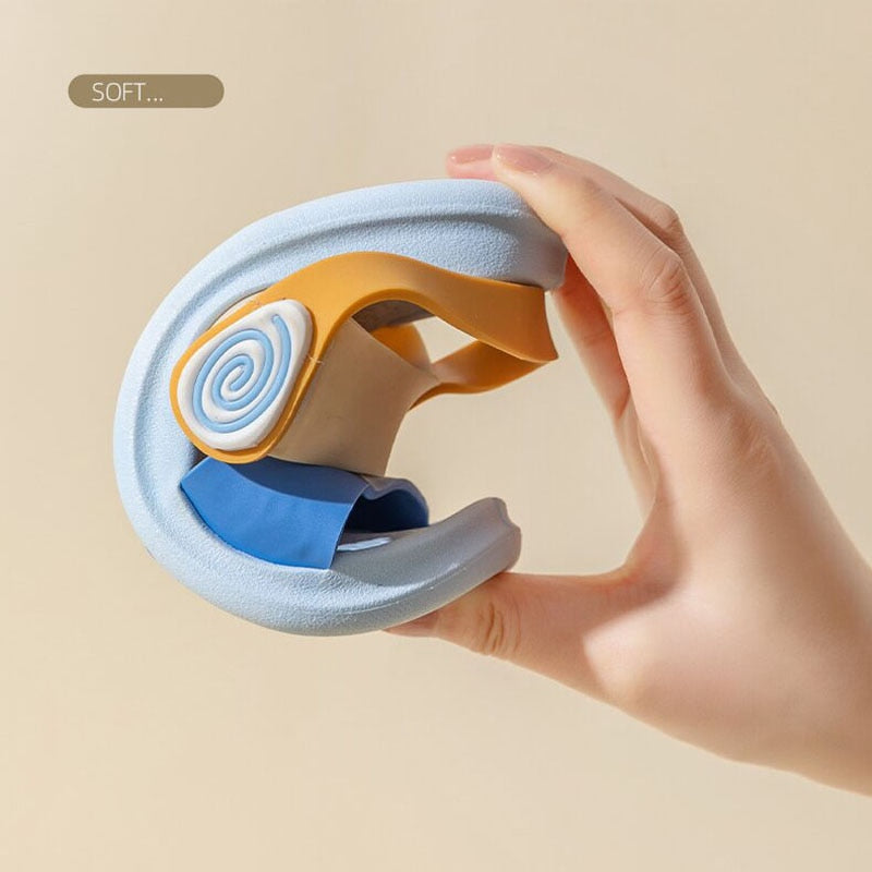 Overhead shot of two girls' soft sole sandals, lightweight & flexible, essential for summer activities.