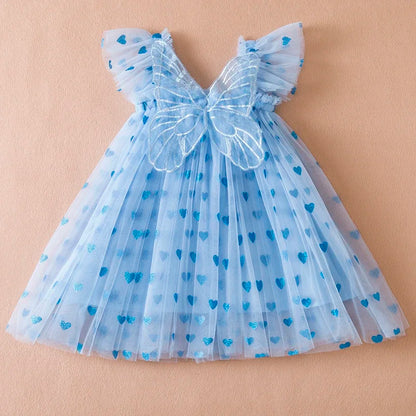 Kids fashion: Purple tulle party dress for girls, featuring elegant back bow and delicate wings.