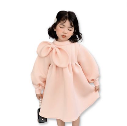 Toddler girls' vintage pink dress with prominent bow and ruched design, great for parties