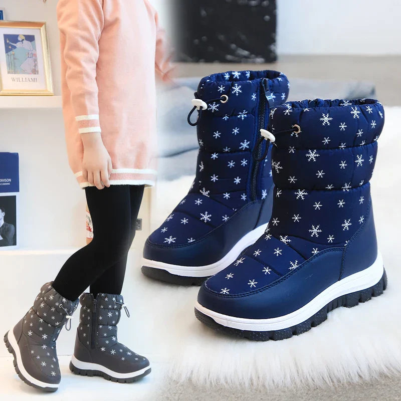Toddler girls' warm purple snow boots, durable and waterproof for winter play.