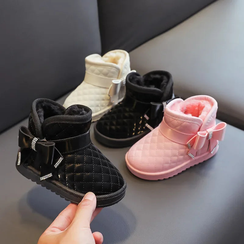 Girls pink winter non-slip snow boots with warm lining, perfect toddler waterproof footwear.