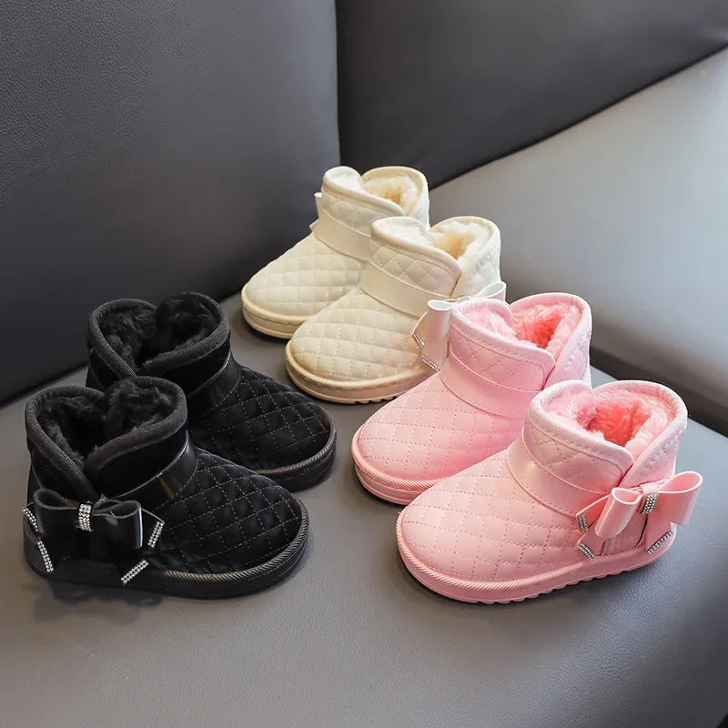 Warm, easy-wear girls snow boots in red, non-slip sole ideal for winter kids footwear.
