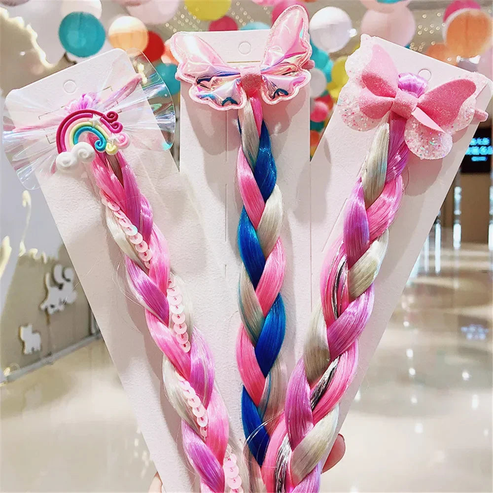 Kids rainbow hair bow with braided extensions, a wig hair tie for toddler hair accessory and party fun