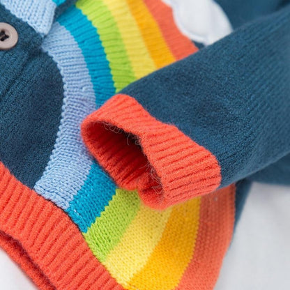 Front view of a girls' knitted cardigan featuring a playful clouds & rainbow print, winter sweater.