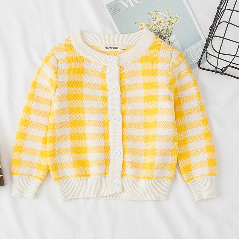 Girls' colorful knitted cardigan with rainbow and cloud motif, ideal for children's fashion.