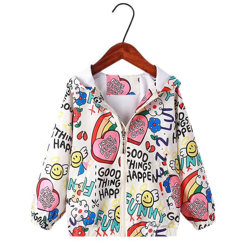 Little girl showing off her new rainbow unicorn hooded jacket, durable kids playwear fashion
