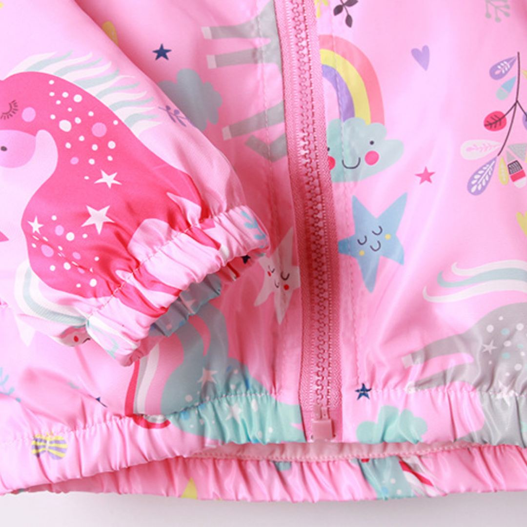 Full view of a girls' unicorn hooded windbreaker, practical and stylish kids outerwear for all seasons