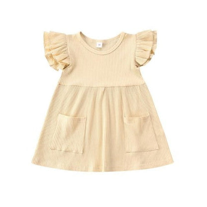 Adorable sleeveless ribbed knit dress for baby girls, featuring ruffles and front pockets, perfect for playtime.