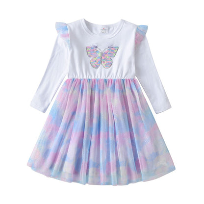 Toddler girl twirling in a pink cotton sequin butterfly long sleeve princess dress, party ready