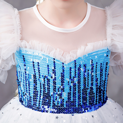 Toddler girl in sparkly blue sequin puff sleeve snow princess dress, perfect for birthdays