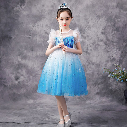 Close-up of blue sequin detail on a girls' puff sleeve snow princess party dress