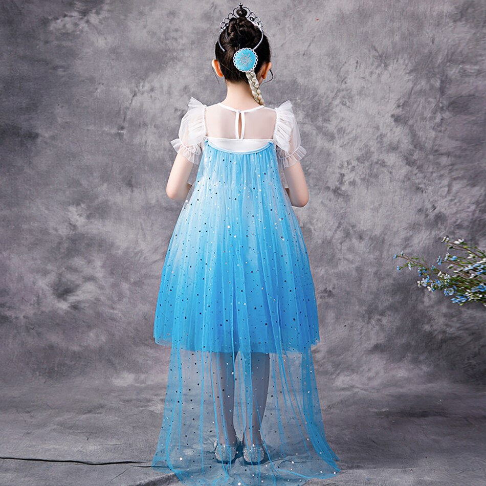 Full view of a girls' blue snow princess dress with sequin bodice and puff sleeves
