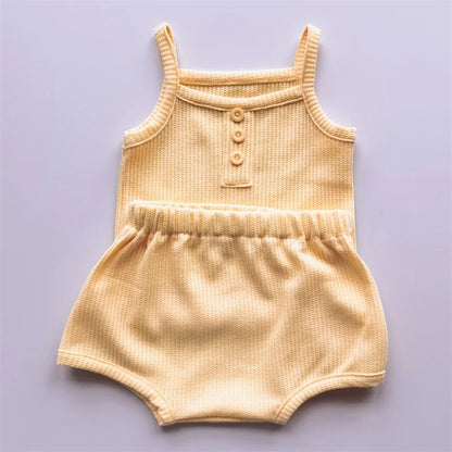 Stylish sleeveless cotton outfit for young girls, perfect for summer fashion
