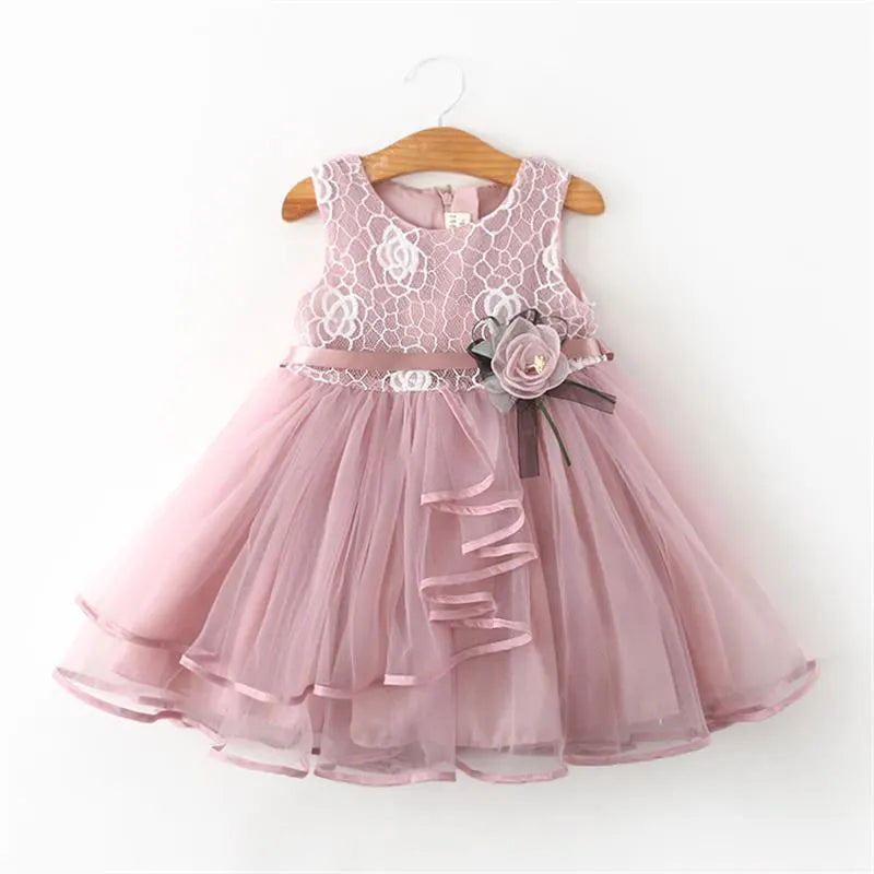 Detailed shot of the floral pattern on a girl's casual princess tutu dress.