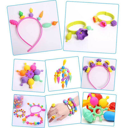Close-up of vibrant snap pop beads from a Girls' Jewelry Making Kit, perfect for small hands.