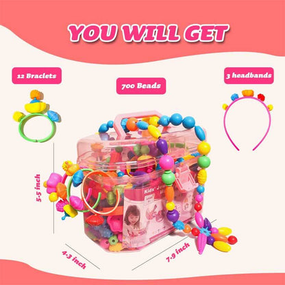 Various pop beads, rings, and connectors from a Girls' DIY Jewelry Kit; promotes fine motor skills.