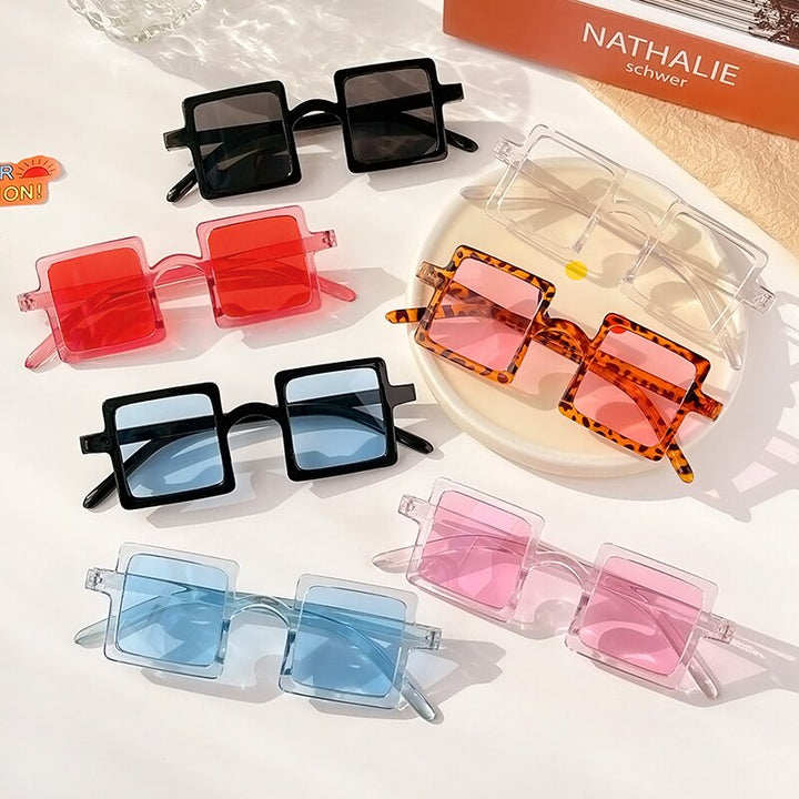 Children's fashion geometric sunglasses, providing stylish sun protection & comfort fit for girls' eyes.