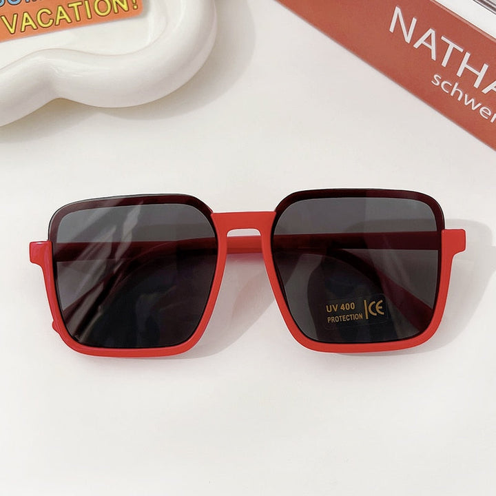 Kids' rectangle sunglasses with geometric frames, offering essential UV eye protection for girls.