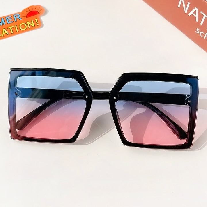 Stylish girls' shades, geometric design for children's fashion, providing sun protection and comfort.