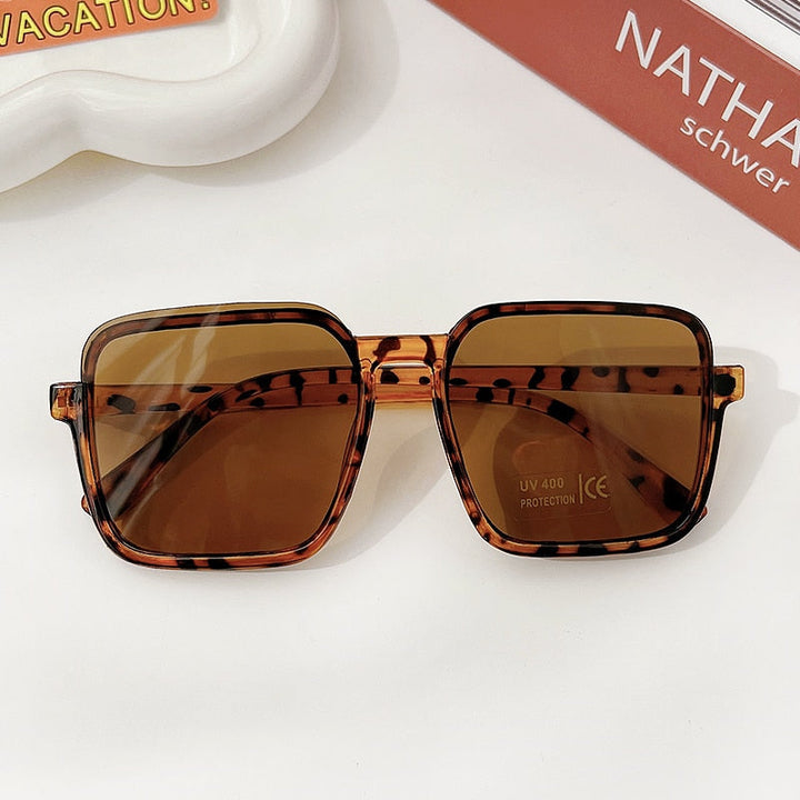 Stylish geometric shades for girls, an outdoor accessory offering great sun protection.