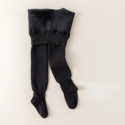 Detail of fabric texture on thick fleece-lined baby leggings, warm & soft