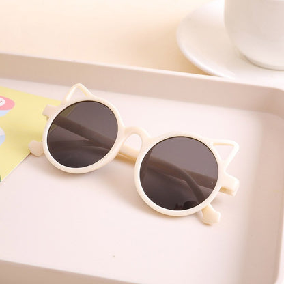 Studio shot: Girls' green mirrored sunglasses, trendy kids' UV protection eyewear accessory