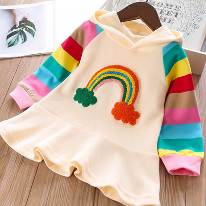Bright pink knit unicorn sweater top attached to a flowing rainbow mesh toddler dress
