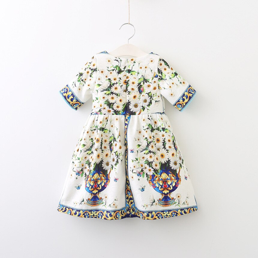 Elegant girls' vintage floral party dress for special occasions, featuring a charming bloom pattern.