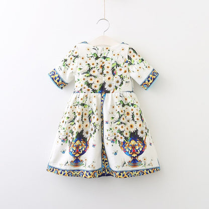 Elegant girls' vintage floral party dress for special occasions, featuring a charming bloom pattern.