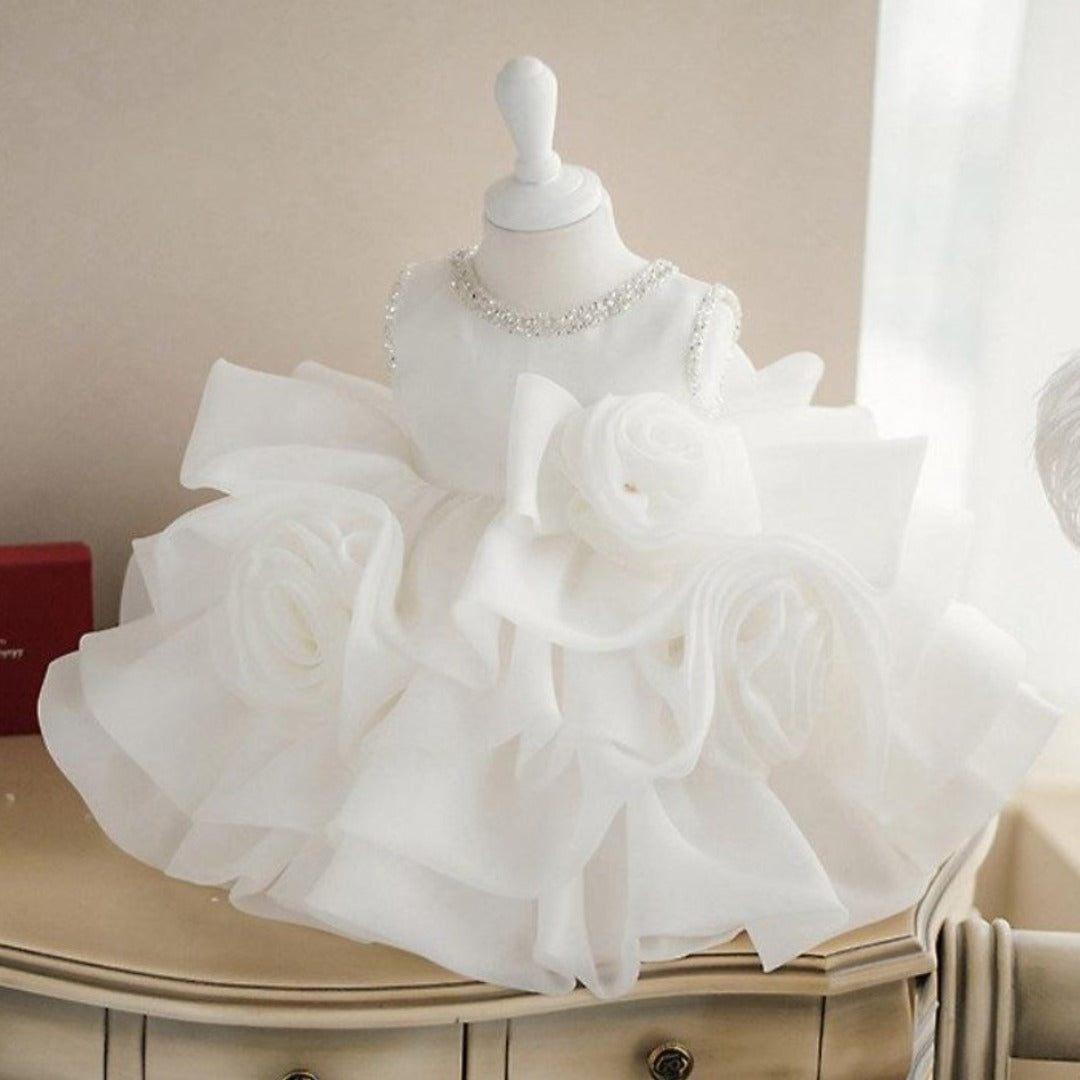 Girls' white lace tulle princess ball gown, perfect for special occasions like weddings or baptisms.