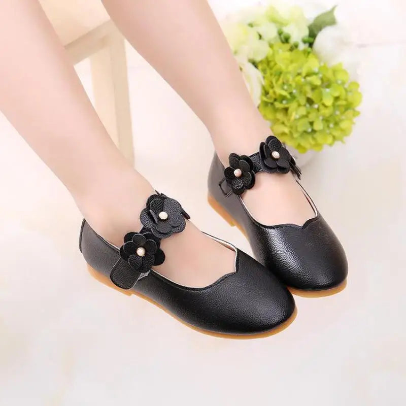 White PU leather girls sandals, princess style with secure buckle, ideal for formal occasions.