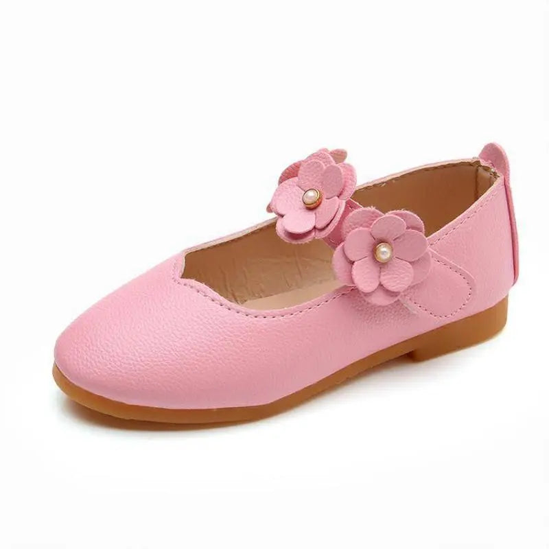 Kids formal white leather sandals with princess detailing and a practical buckle strap.