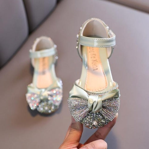 Toddler girl's princess flats with sparkling rhinestones and delicate pearls and bow detail
