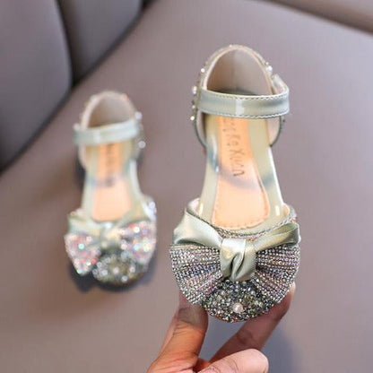Toddler girl's princess flats with sparkling rhinestones and delicate pearls and bow detail