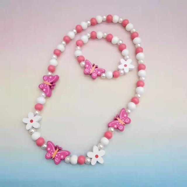 Vibrant wooden animal necklace for girls with a matching bracelet, a fun kids' accessory.