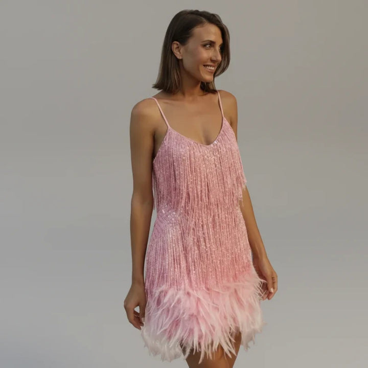 Figure-hugging fringe mini dress for women, sparkling and glamorous, designed for memorable party nights.