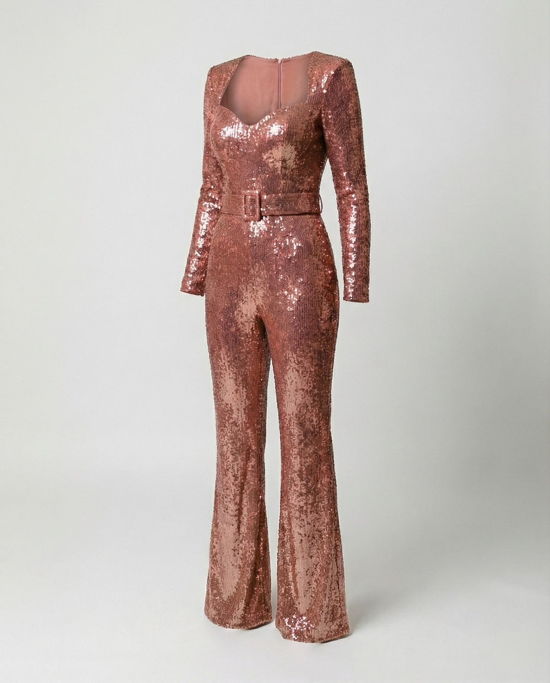Women's shimmering sequin jumpsuit with long sleeves, a glamorous figure-hugging formal outfit for evening & parties.