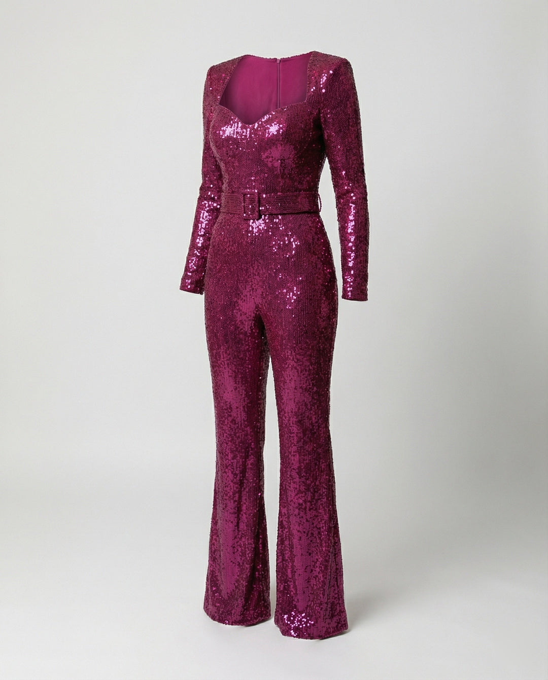Luxurious long-sleeve sequin jumpsuit for women, a glamorous, figure-hugging party or formal evening wear statement.