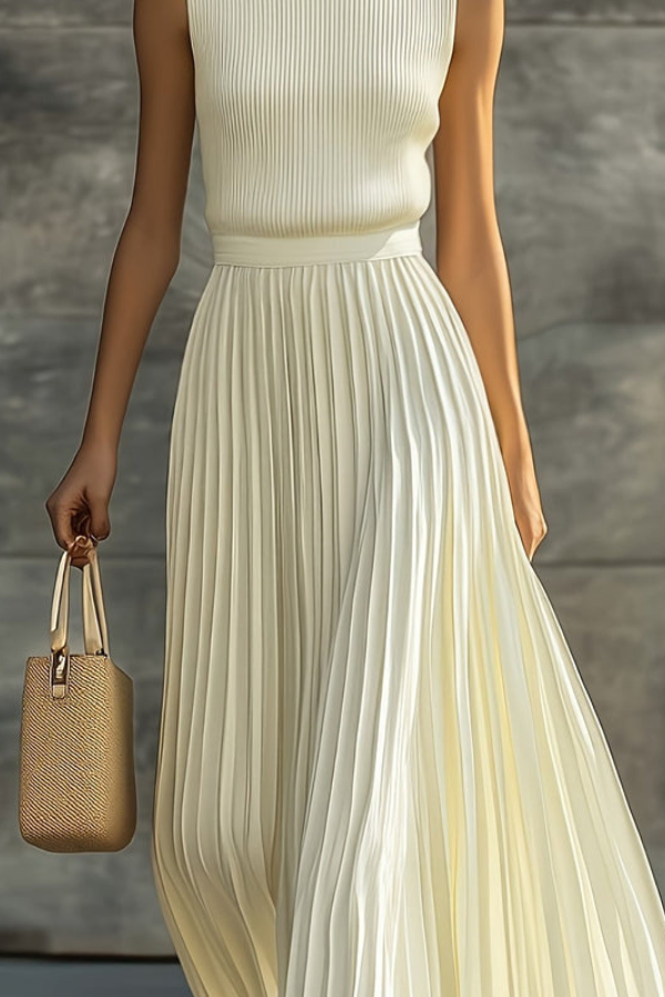 Elegant women's sleeveless pleated midi dress for casual daytime wear, summer events, or vacation trips. Relaxed fit.