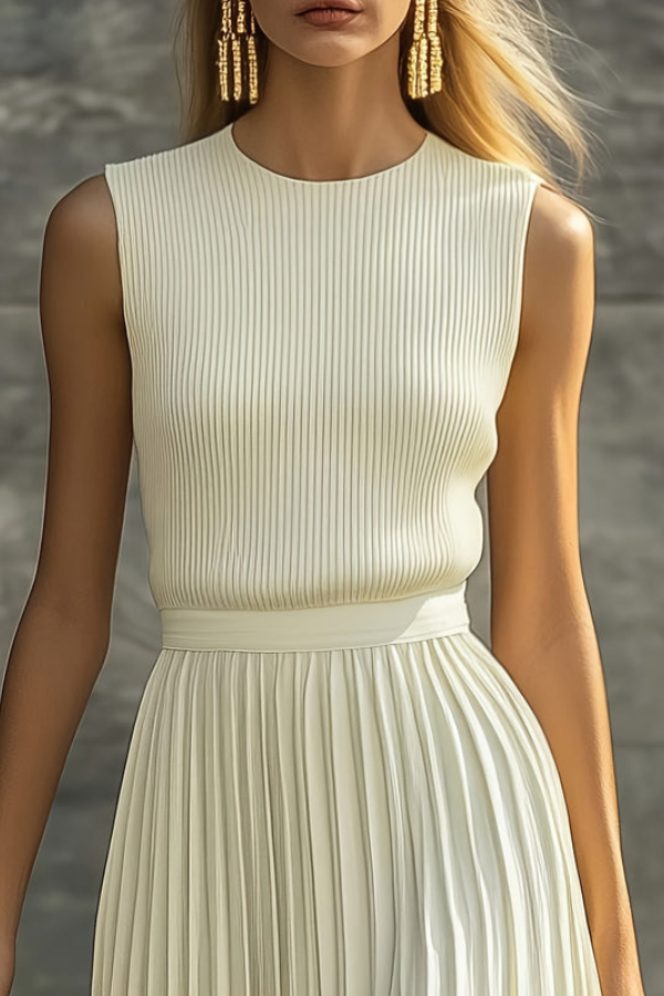 Flowy pleated sleeveless midi dress for women, ideal as a comfortable day dress or chic evening wear. Elegant style.