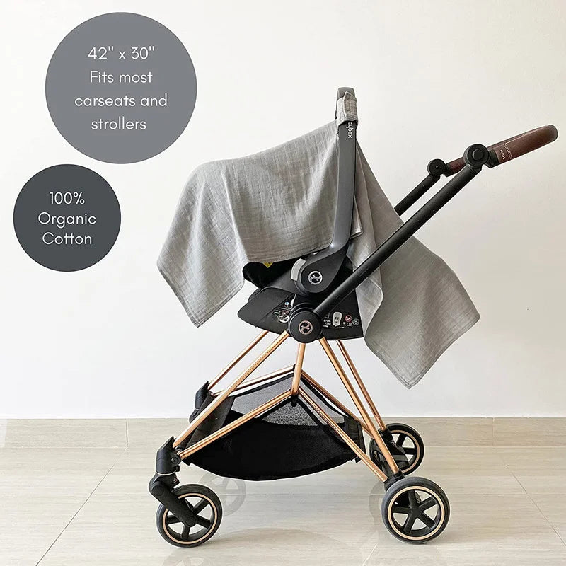 Pink baby stroller cover with elastic band, highlighting easy installation and snug fit.