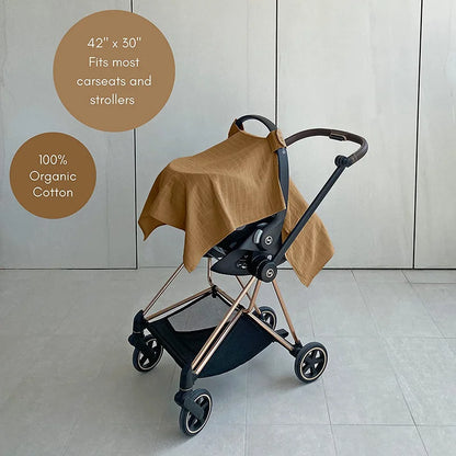 Multiple gray stroller and car seat sun shades folded, showing compact and portable design.