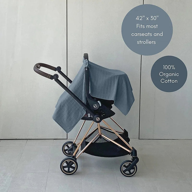 Mom attaching a breathable brown baby sun shade to a stroller, easy and quick installation.