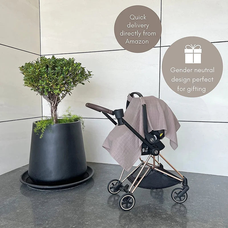 Newborn essential blue car seat cover, offering shade and privacy with breathable fabric.