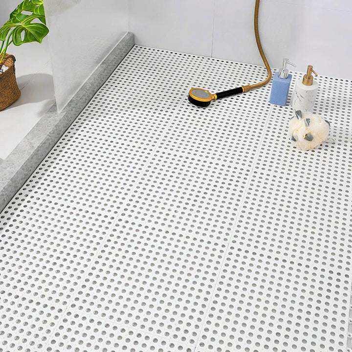 White hygienic non-slip bath mat, cushioned for comfort & superior grip in showers.
