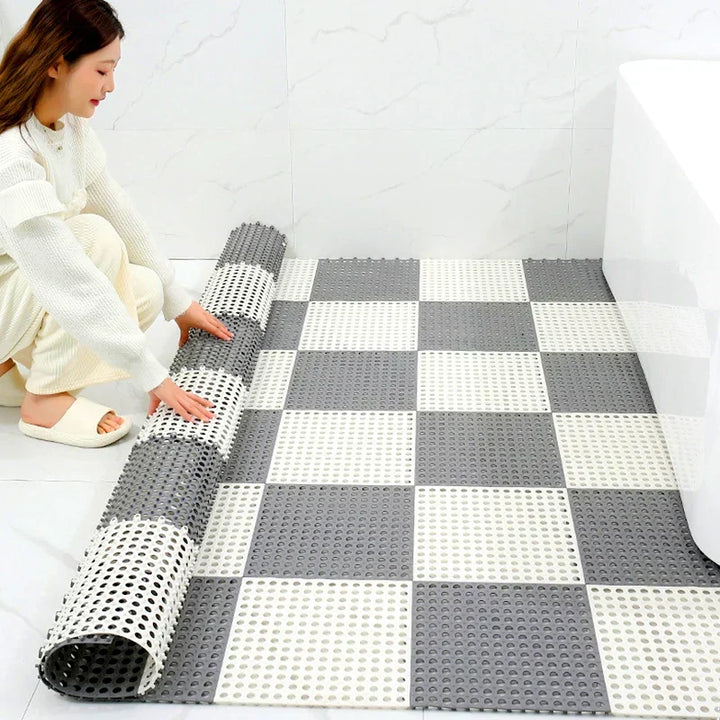 Cushioned non-slip tub mat, fast drying & hygienic, essential shower accessory for safety.