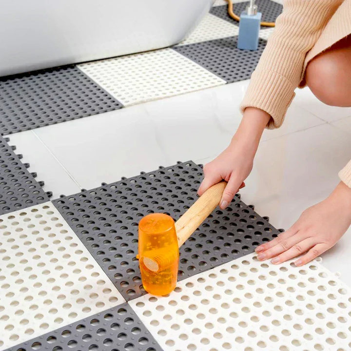 Gray bathroom safety mat, quick-dry & slip-resistant, designed for secure and hygienic showers.