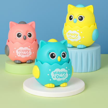 Gray owl wind-up toy, Wobble Hoot, designed for toddlers to develop motor skills, active play.