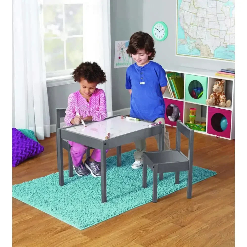 Toddler activity set: gray rubberwood table and chairs, ideal for young children's playroom or desk.