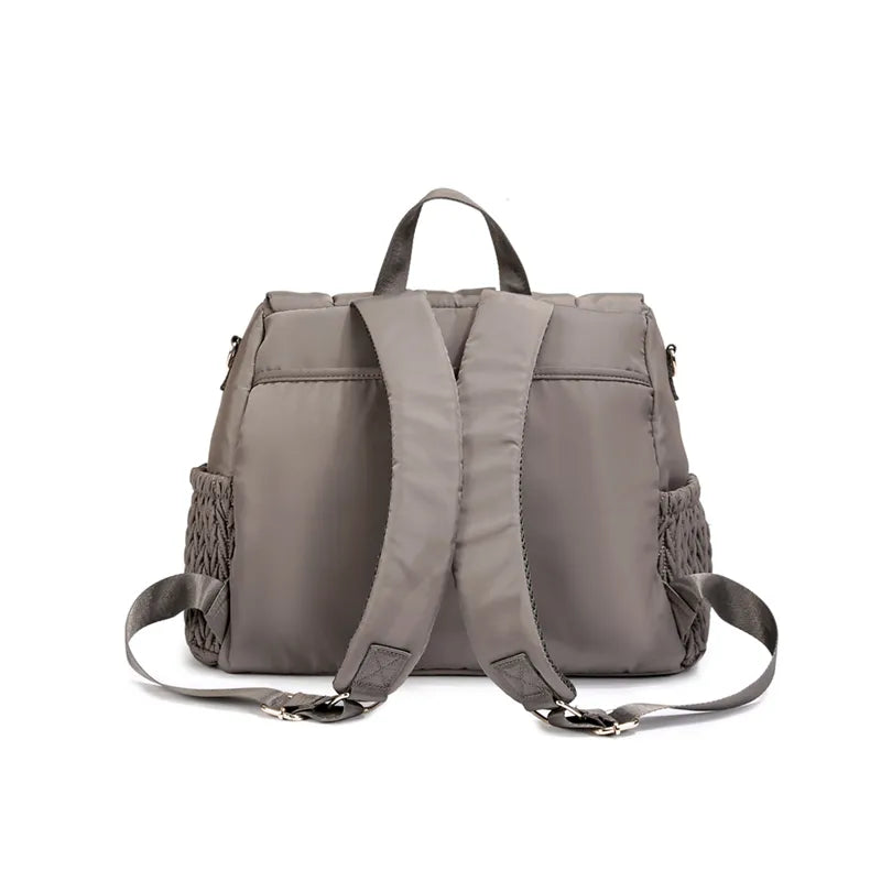 Mommy backpack set featuring a chic gray design, practical baby bottle bag trio